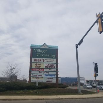 Village Crossing shopping center pylon sign on Touhy Avenue in Skokie, Illinois