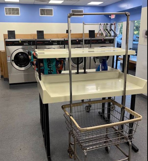 Folding tables and rolling carts at Express Laundromat in Evanston, IL